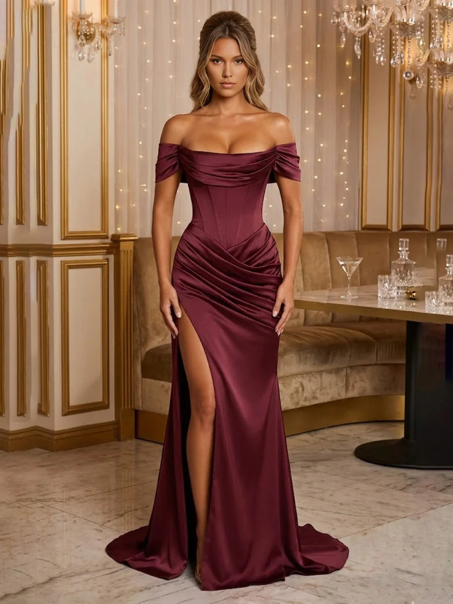 Burgundy off-the-shoulder corset maxi dress with draped bodice and side slit