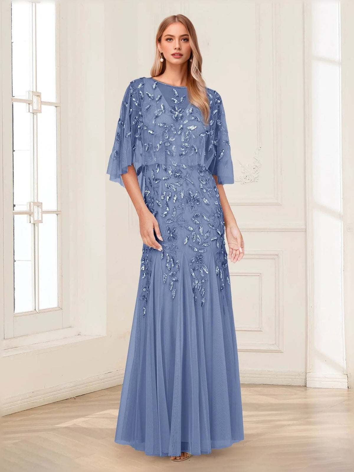 Dusty blue sequin mermaid gown with cape sleeves, floor-length tulle