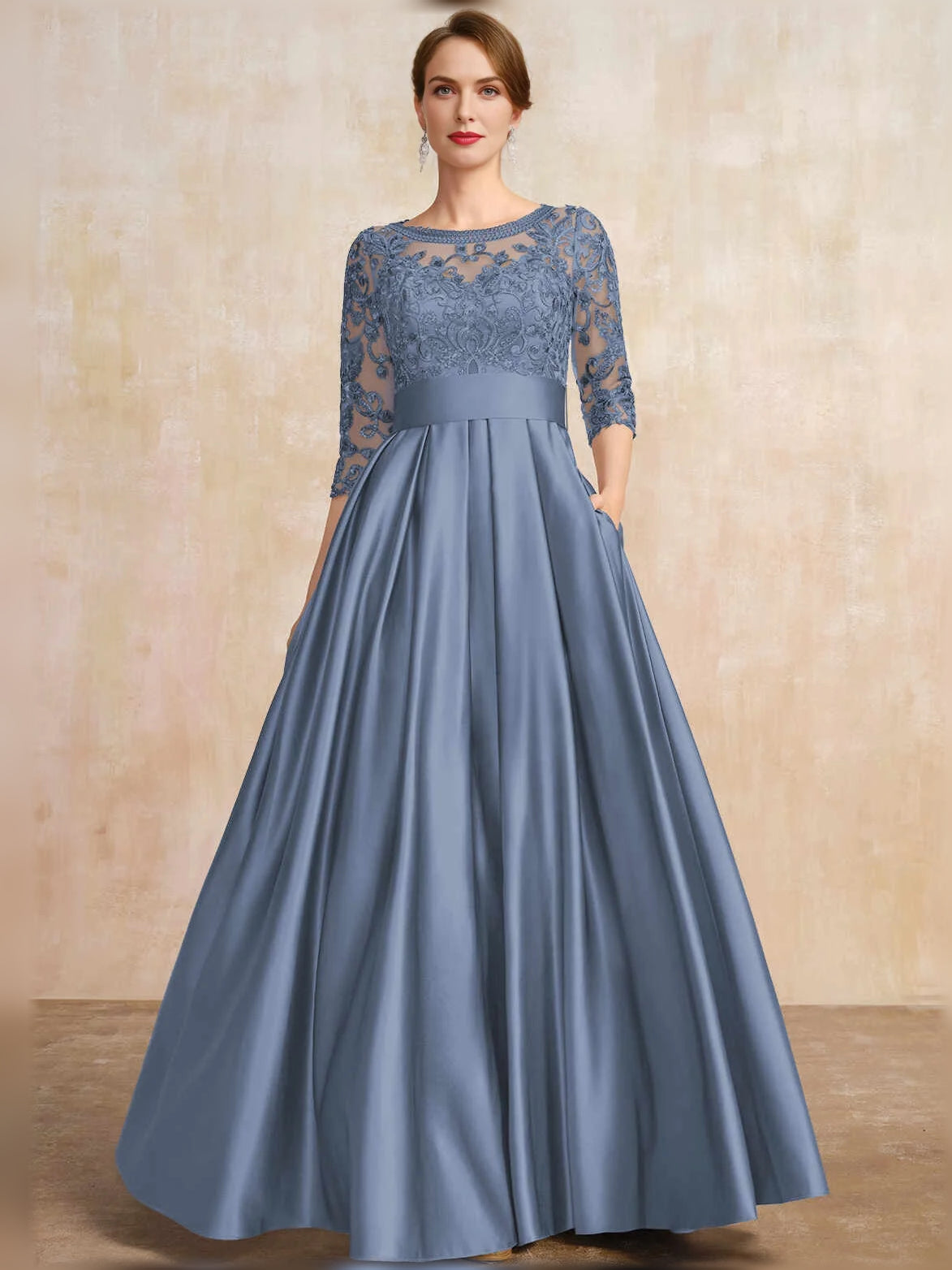 Light-to-medium blue satin A-line dress with lace sleeves, scoop neck, pleated skirt