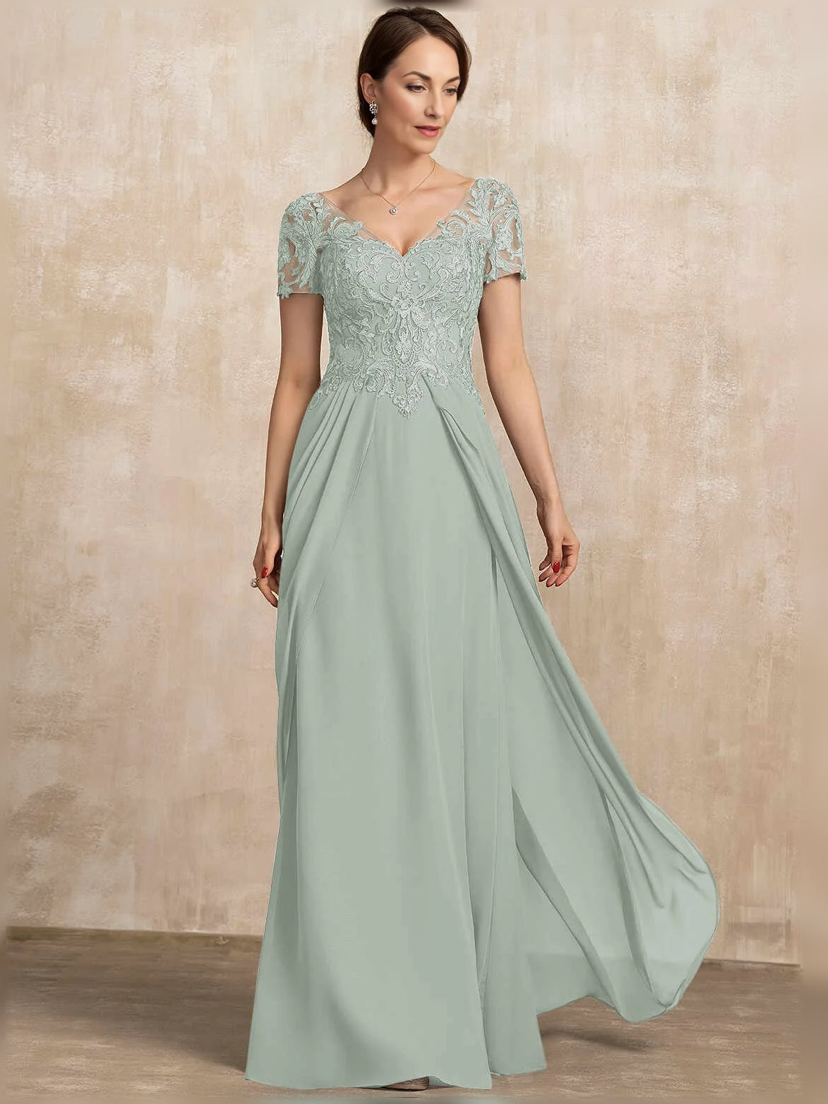 Mint green chiffon V-neck A-line dress with pleated bodice and side slit, floor length