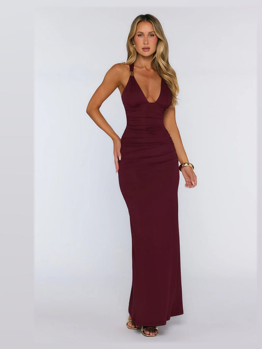 Burgundy sleeveless V-neck fitted maxi dress with ruched midsection and long skirt