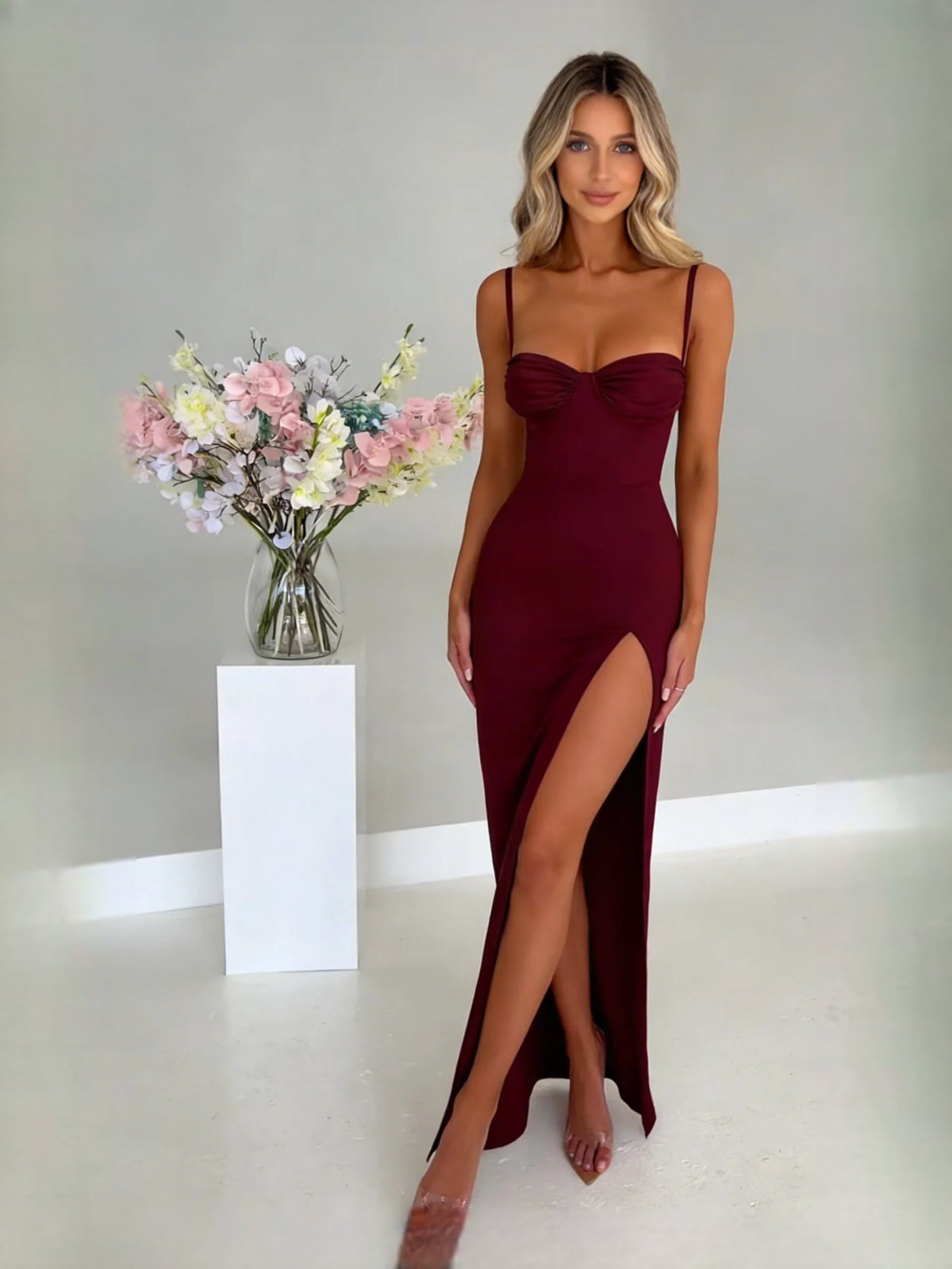 Cabernet satin sweetheart neckline fitted dress with spaghetti straps and high side slit