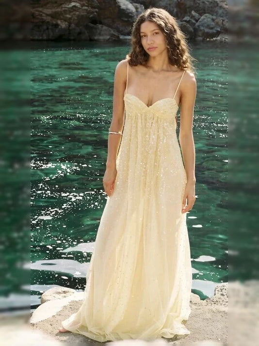 Light yellow tulle prom dress with sweetheart neckline, spaghetti straps, beaded A-line skirt
