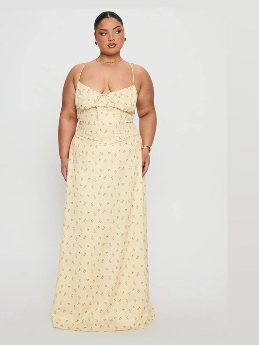 Cream floral spaghetti-strap maxi dress with ruched bust and structured woven fabric