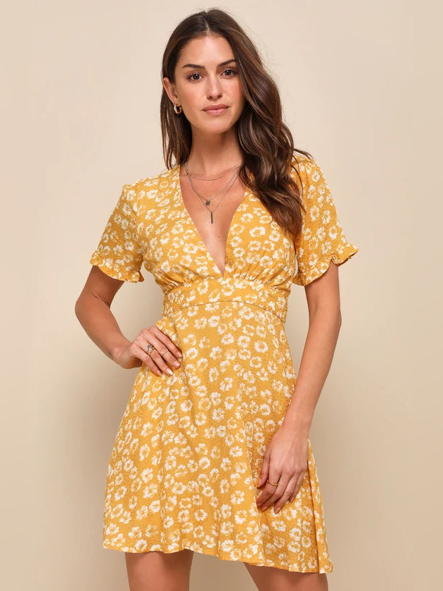Yellow floral mini V-neck dress with short flutter sleeves and tied waist