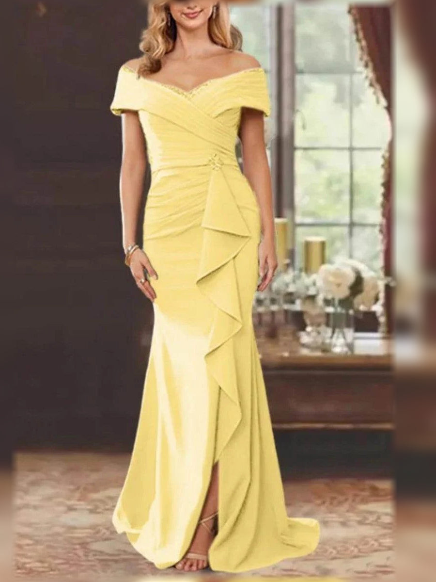 Yellow off-shoulder mermaid gown with ruched bodice and layered ruffle detail