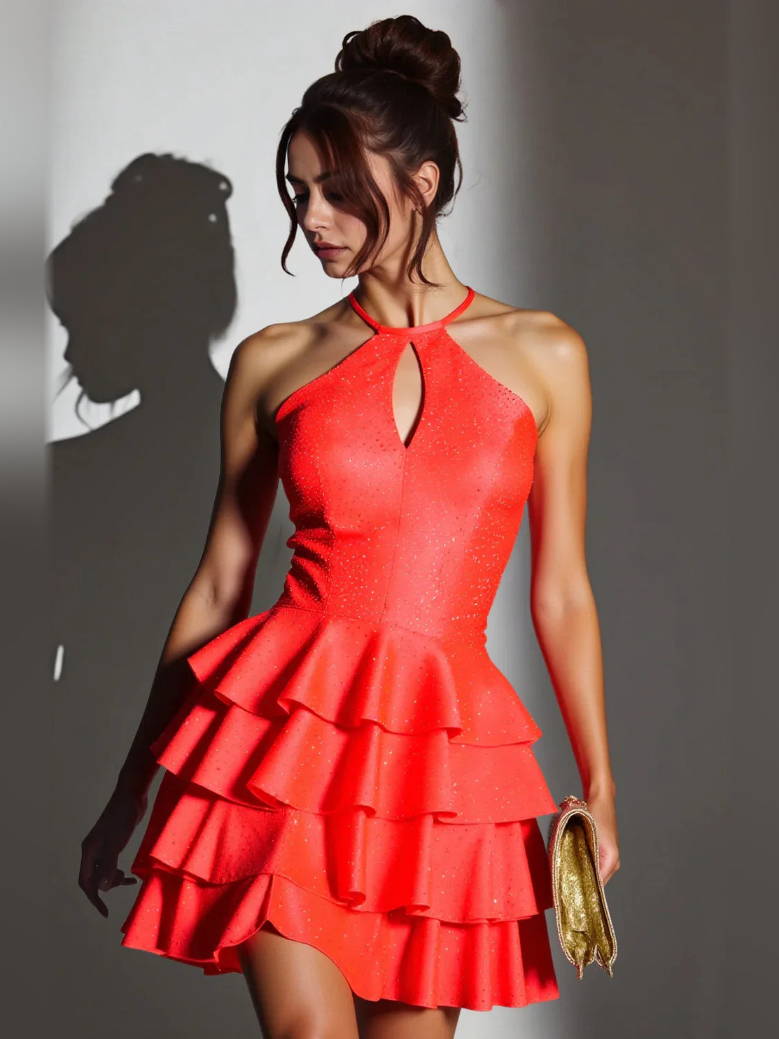 Front halter mini dress in burnt orange with cut-out and layered ruffle tiers