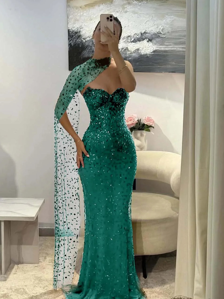 Emerald green sequin sweetheart mermaid prom dress with cut-out back, floor-length