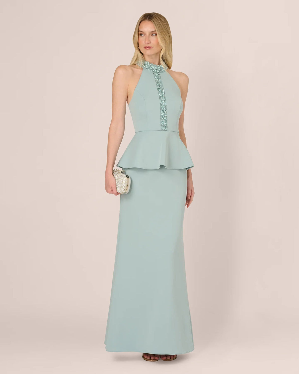 Mint halter neck maxi dress with peplum waist and beaded neckline detail.
