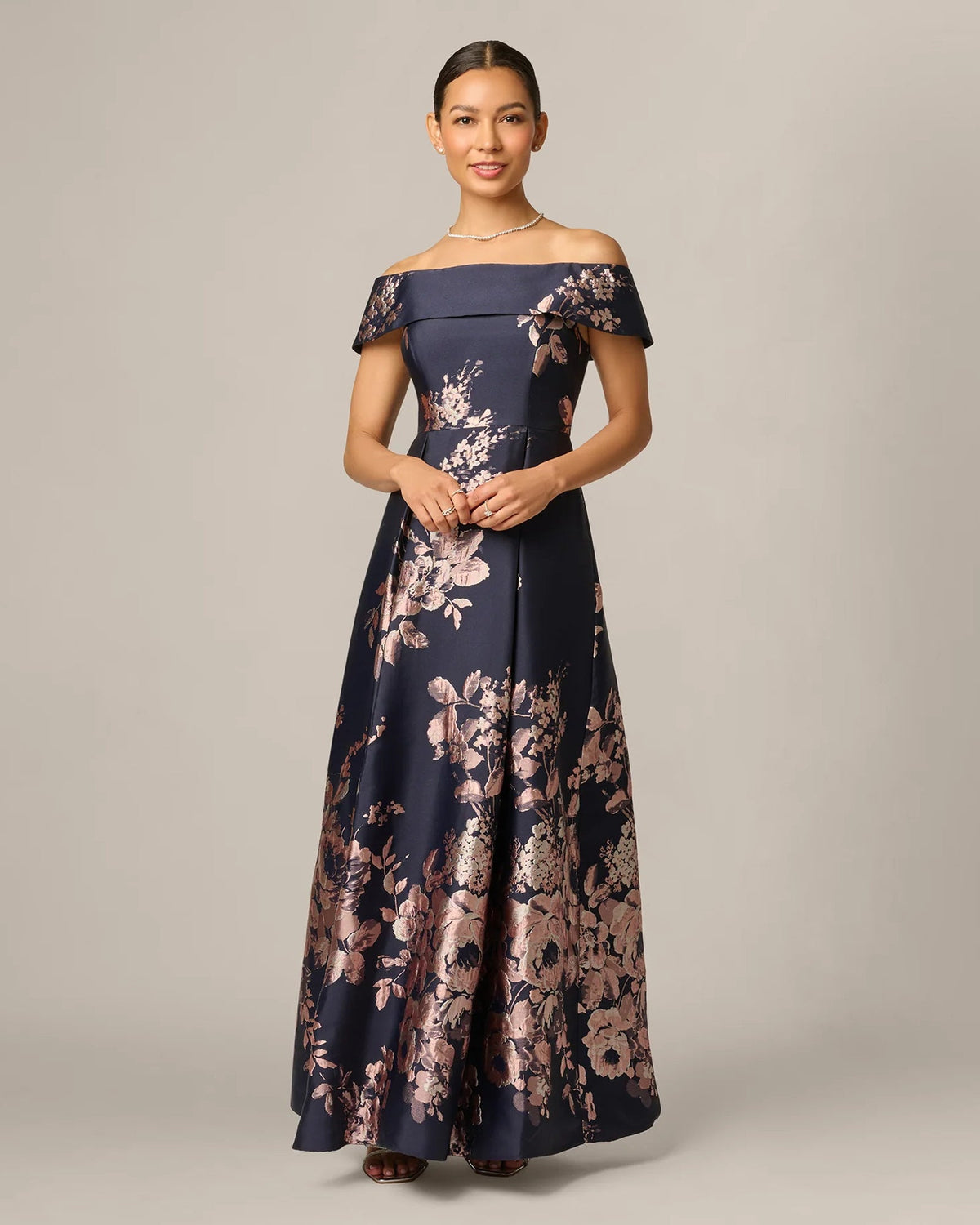 Navy off-shoulder A-line maxi dress with blush floral print, full front view