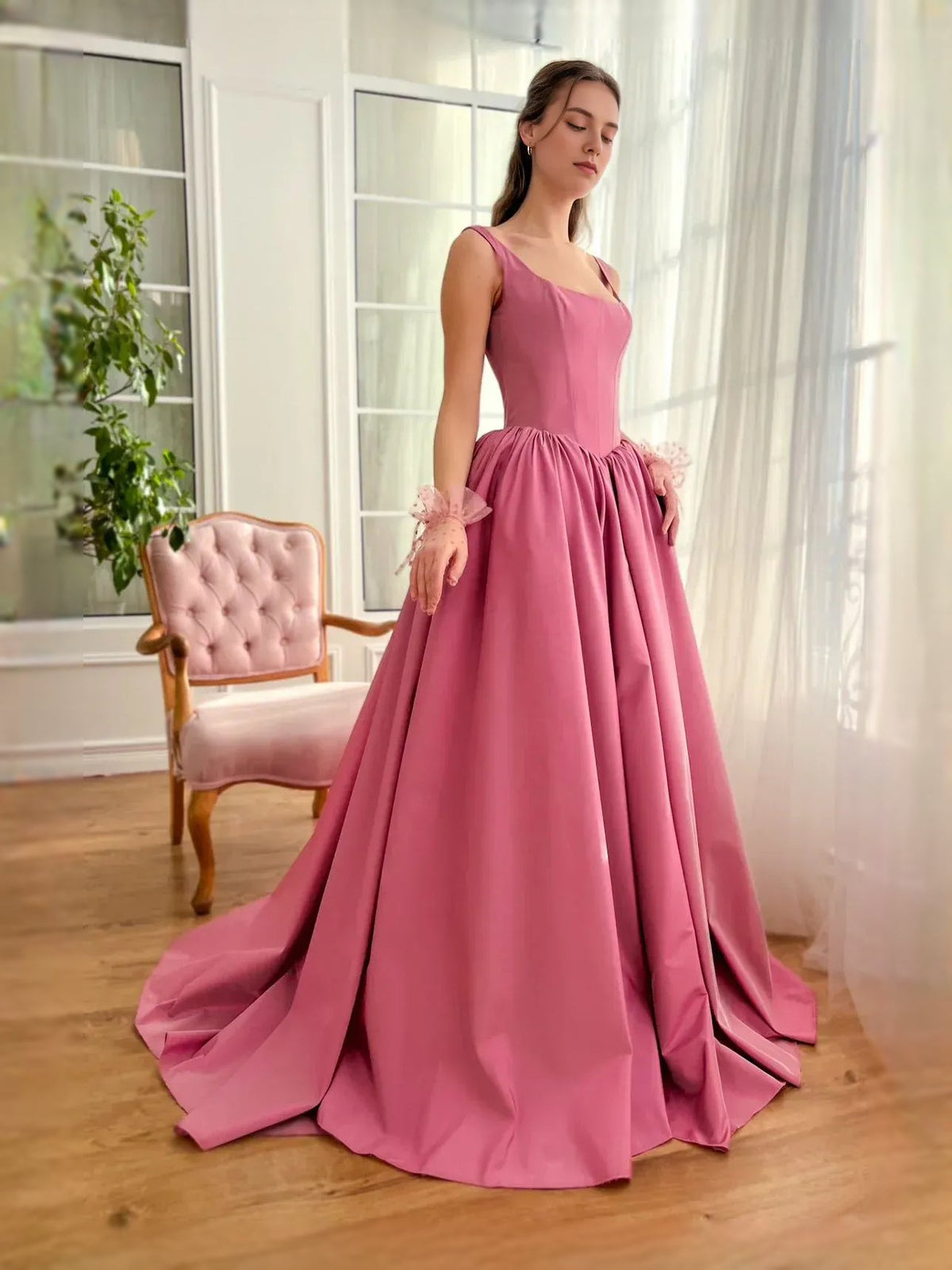 Hot pink satin corset-style A-line maxi dress with gathered skirt and bow waist detail