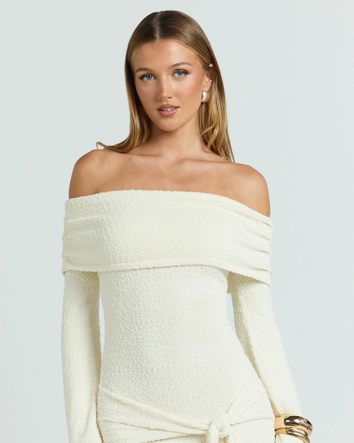 Cream knitted off-shoulder mini dress with off-shoulder neckline and front waist tie