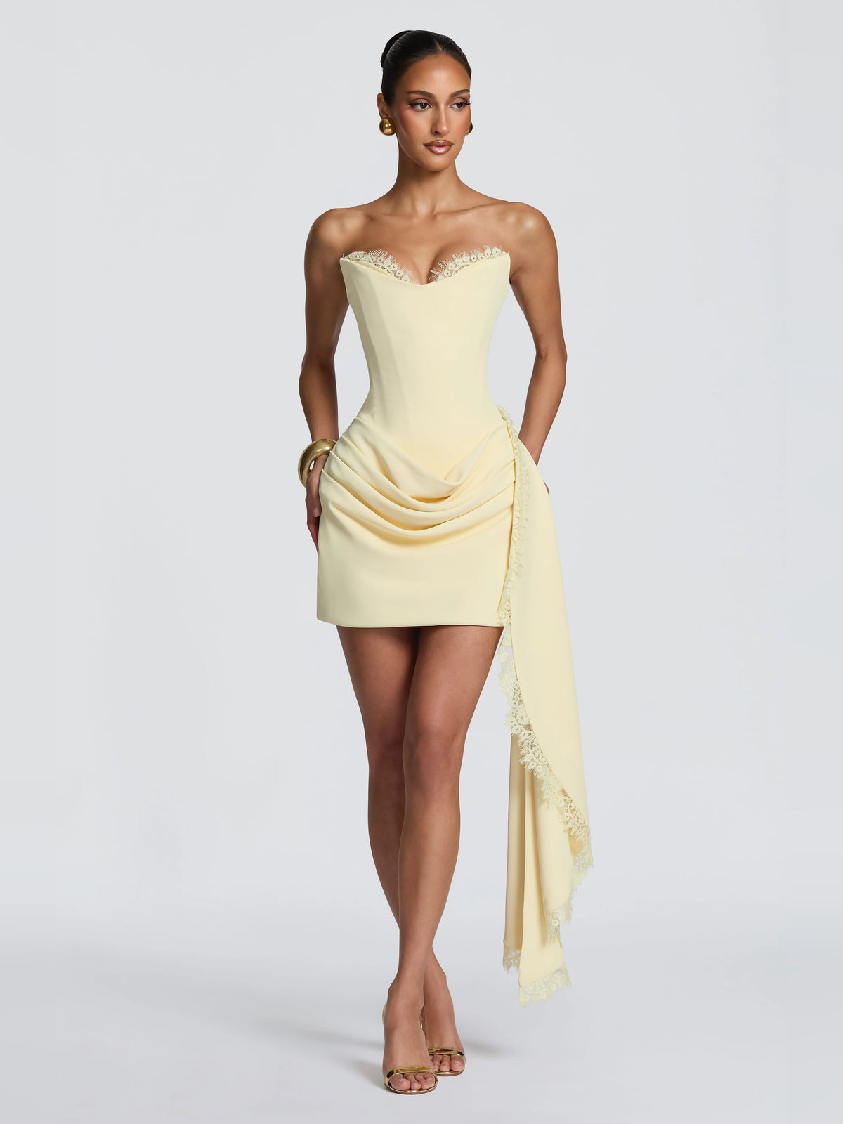 Lemon mini strapless dress with draped front and lace-trimmed side sash, full look