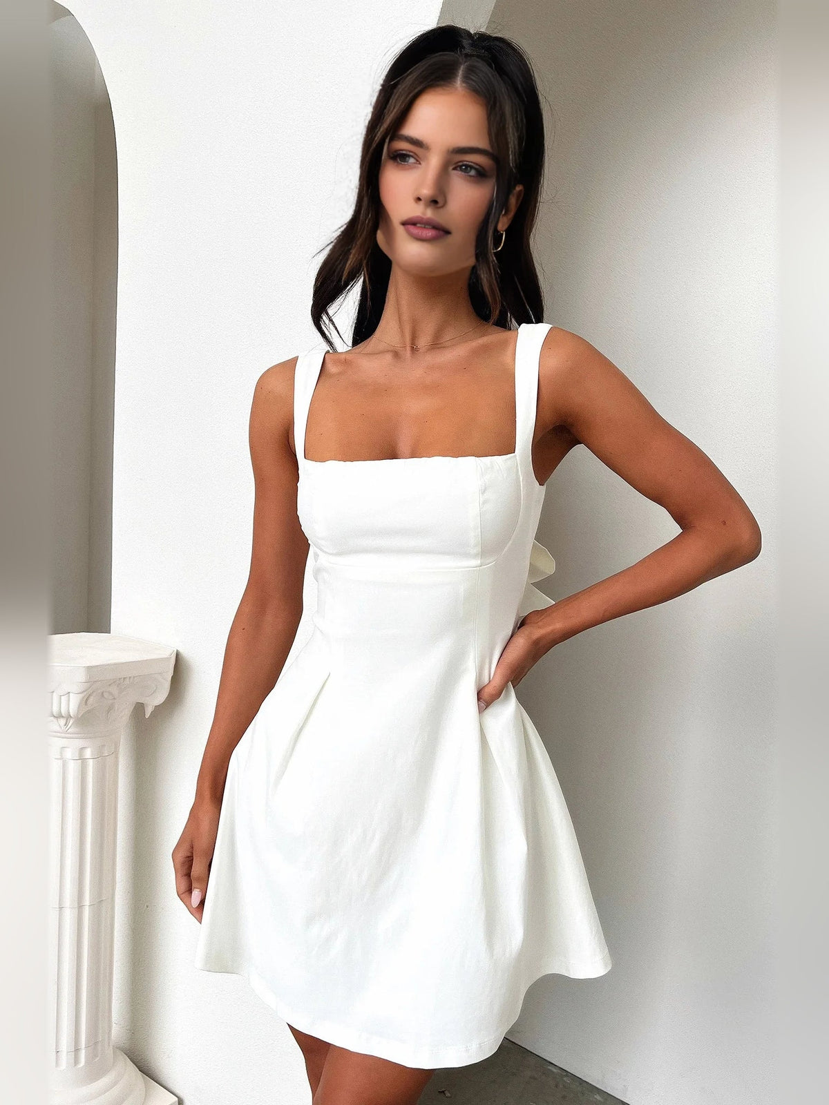 Ivory backless A-line mini dress with square neckline and bow at open back