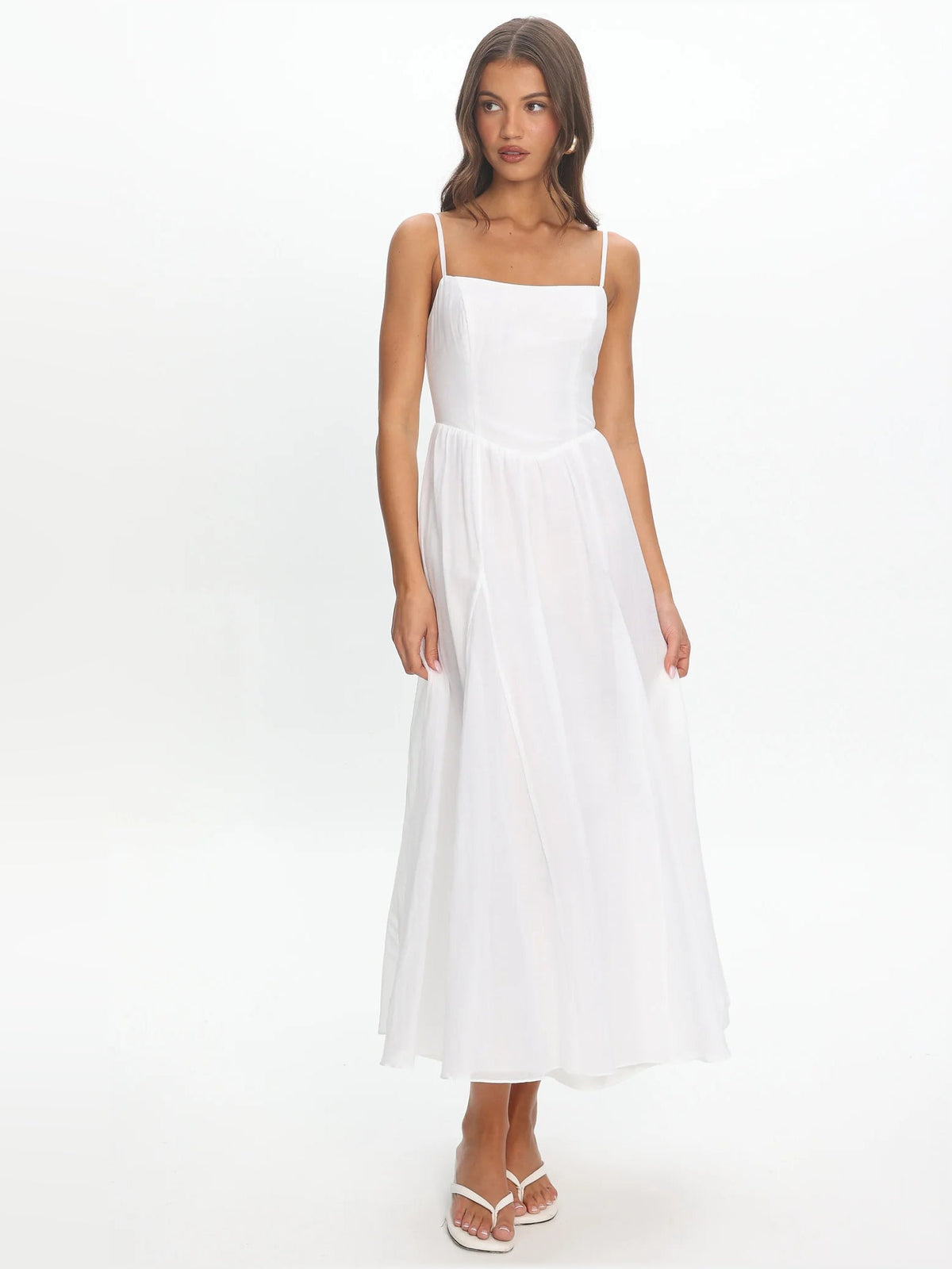 White scoop-neck midi formal dress with spaghetti straps and soft pleated skirt