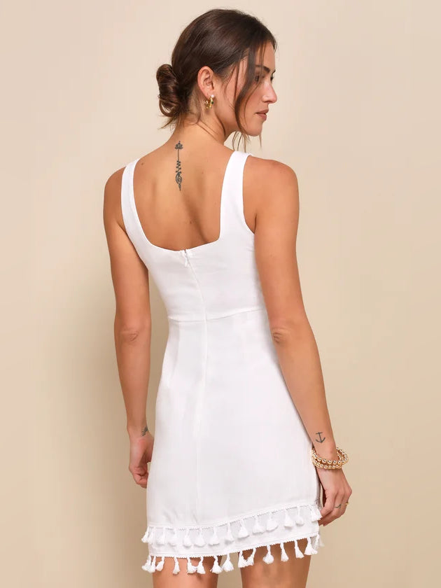 White sleeveless mini dress, open-back design with tassel fringe hem
