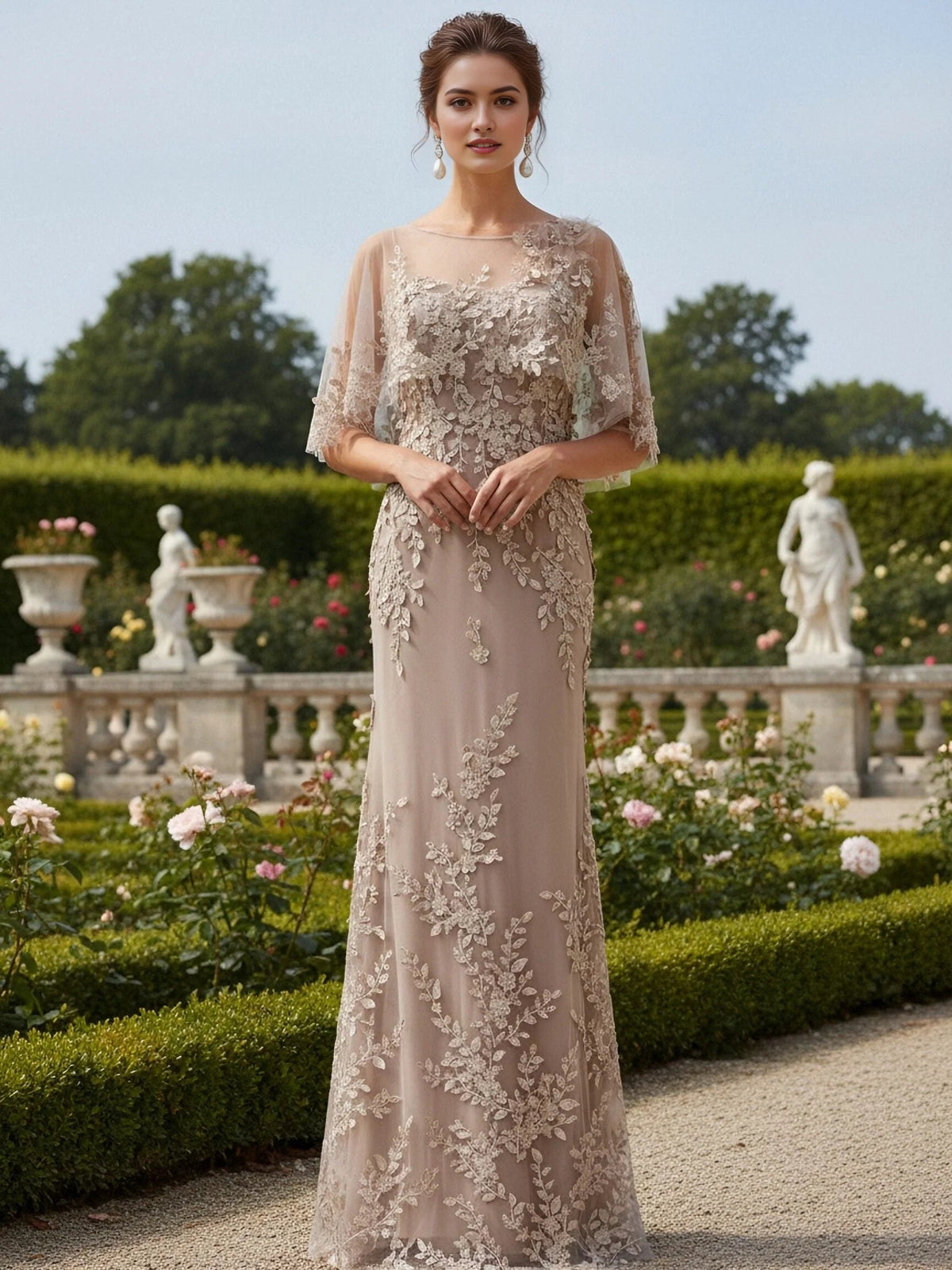 Ivory tulle mermaid maxi dress with floral applique, bateau neckline, long flowing skirt
