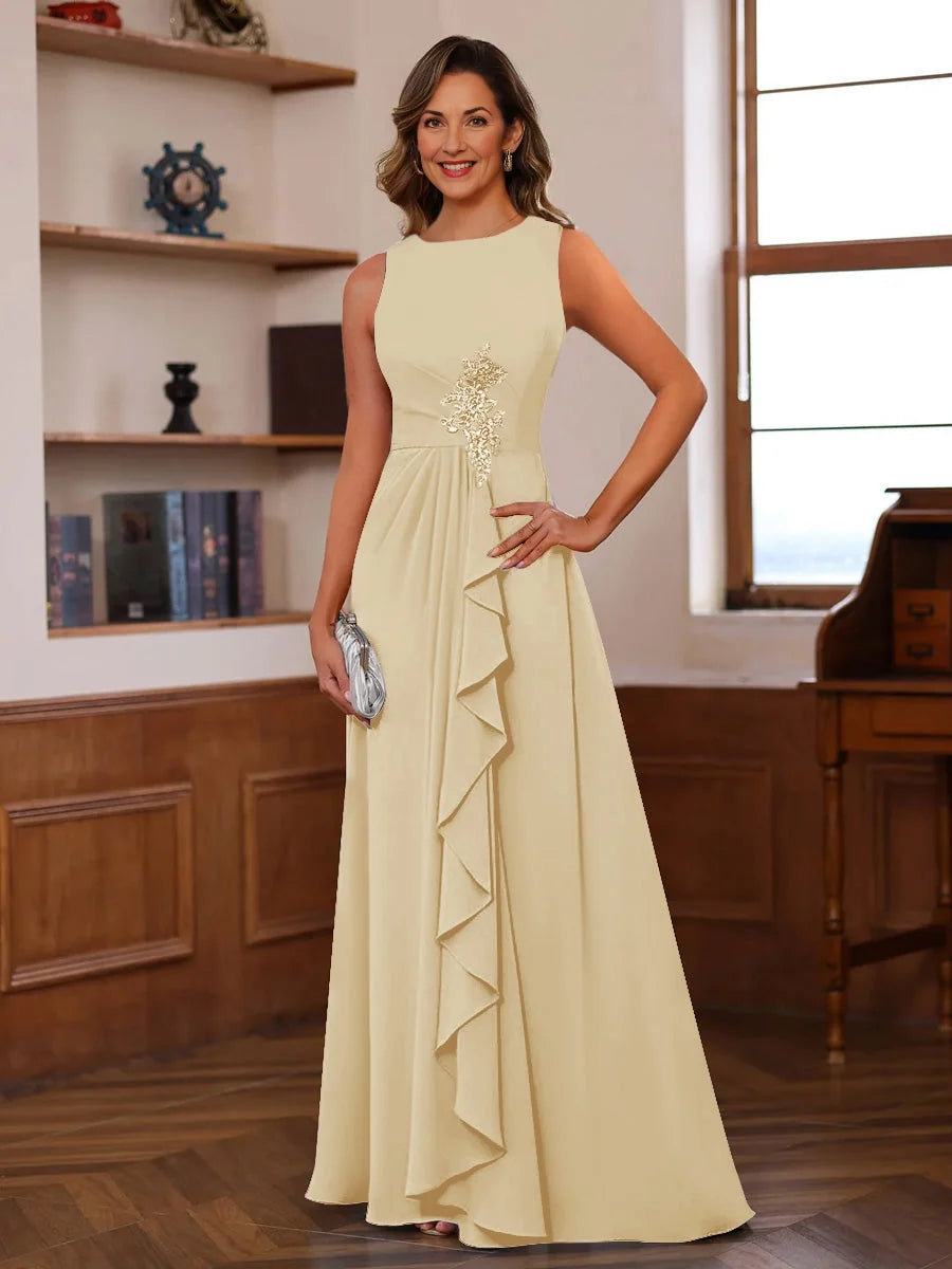 Sleeveless A-line chiffon floor-length dress in ivory with embellished bodice and ruffles