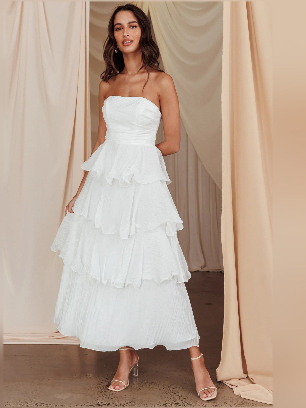 Off-white strapless layered midi formal dress with tiered ruffle layers, full length