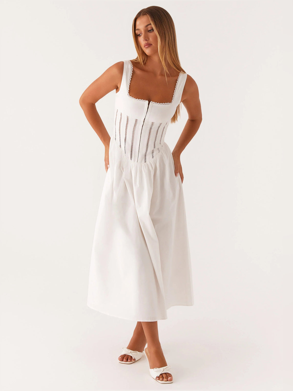 White midi formal dress, sleeveless square neckline, lace trim and vertical seam embroidery