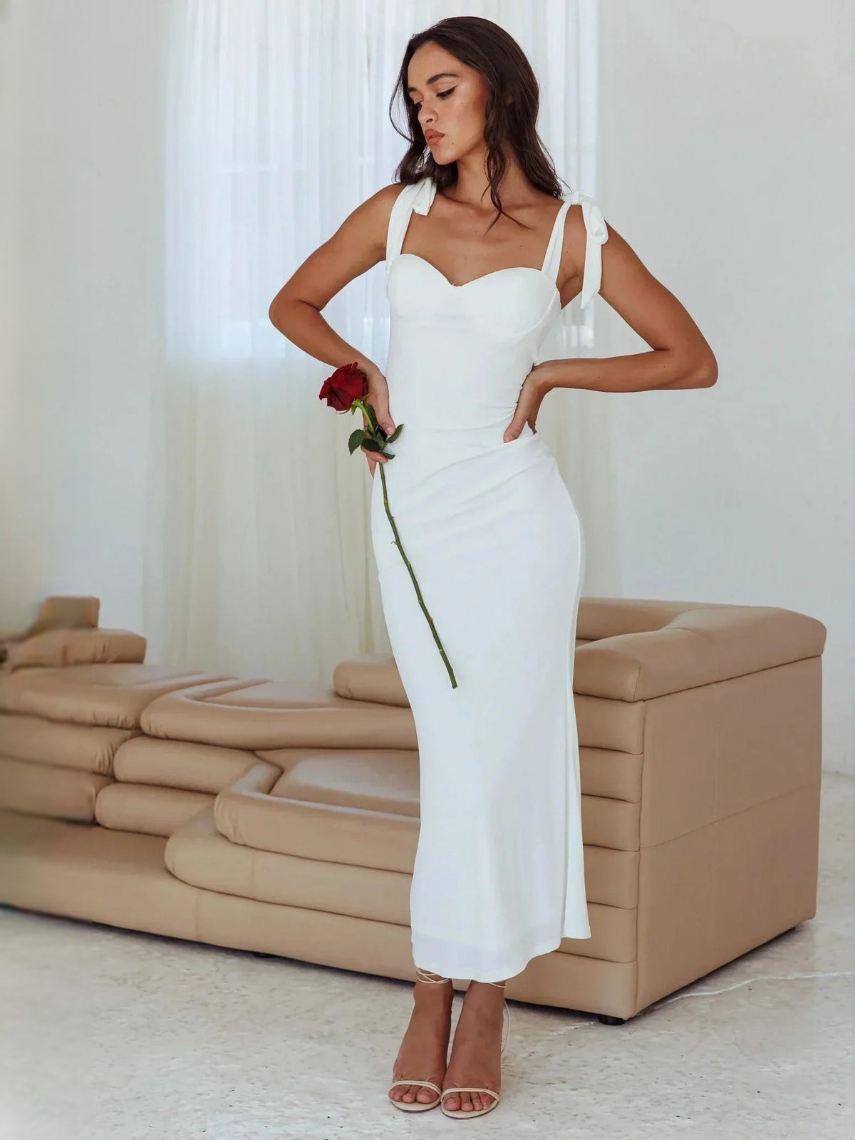 White sweetheart sheath midi wedding dress with bow-tie shoulder straps and sculpted waist