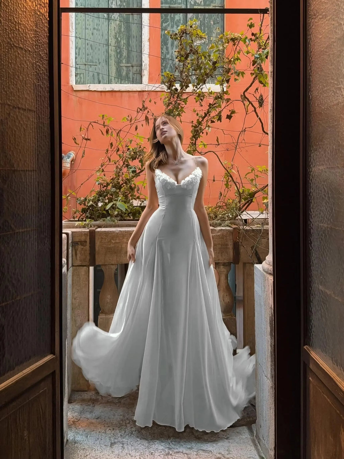 Floor-length white sweetheart A-line prom dress with draped skirt