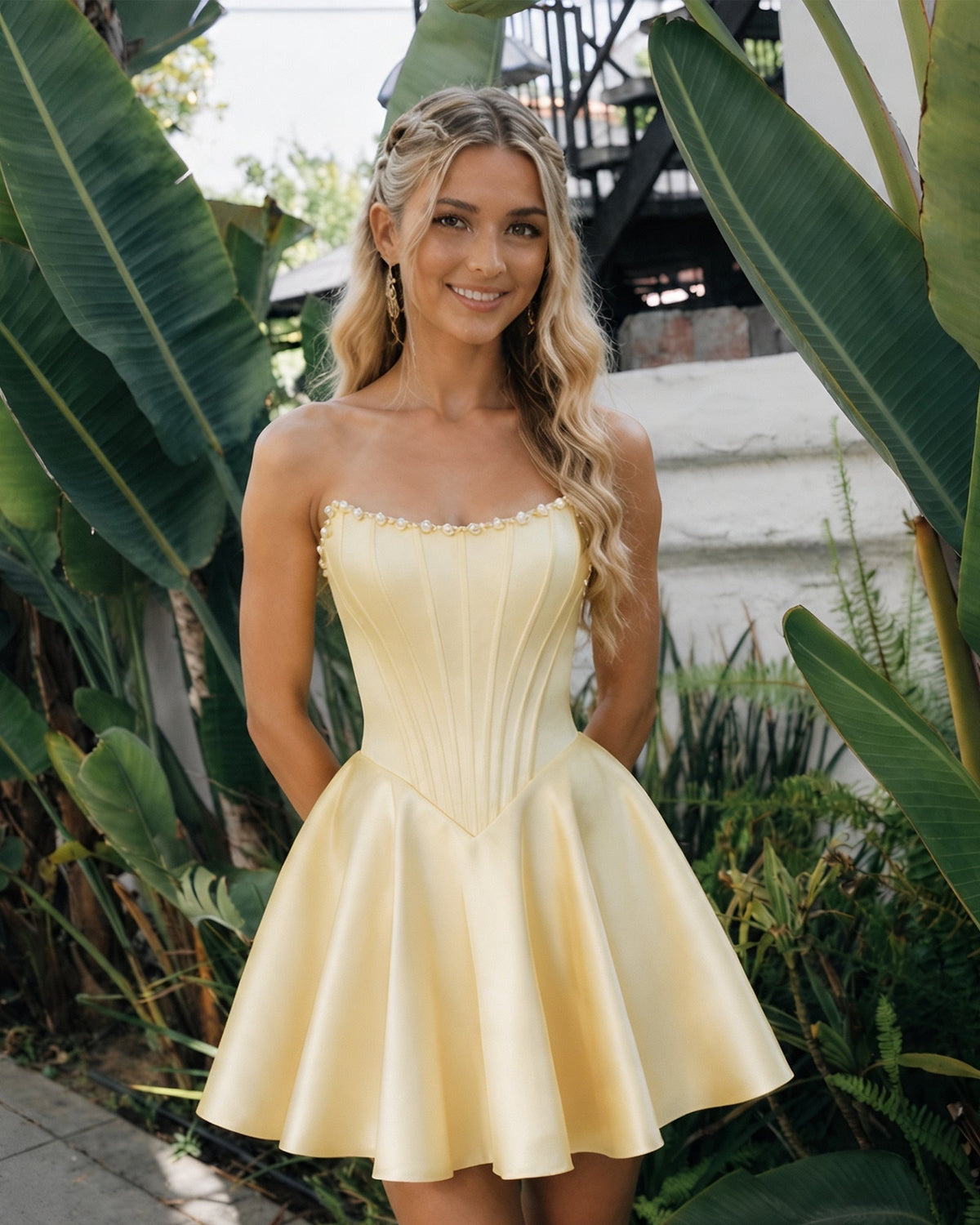 Strapless satin corset homecoming dress, pale yellow with pearl-trim neckline and flared skirt
