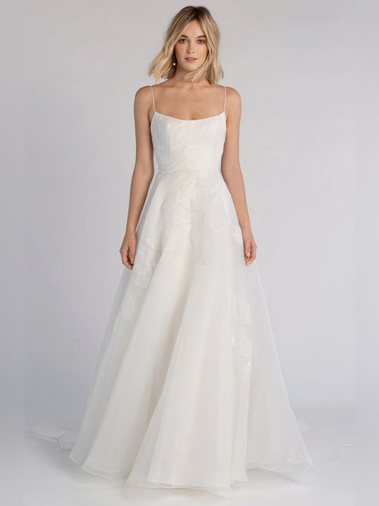 Ivory scoop-neck ball-gown formal dress with spaghetti straps and floor-length tulle skirt