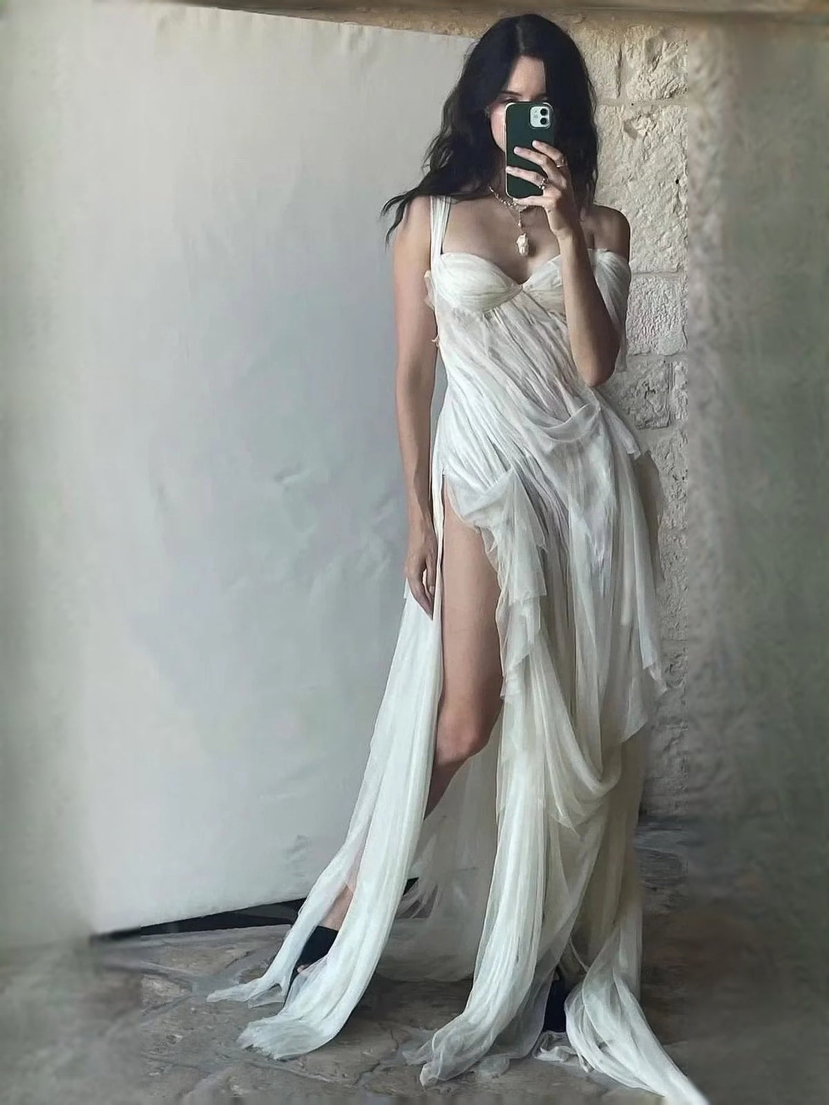 Ivory sweetheart prom maxi dress with sweetheart neckline and layered skirt slit