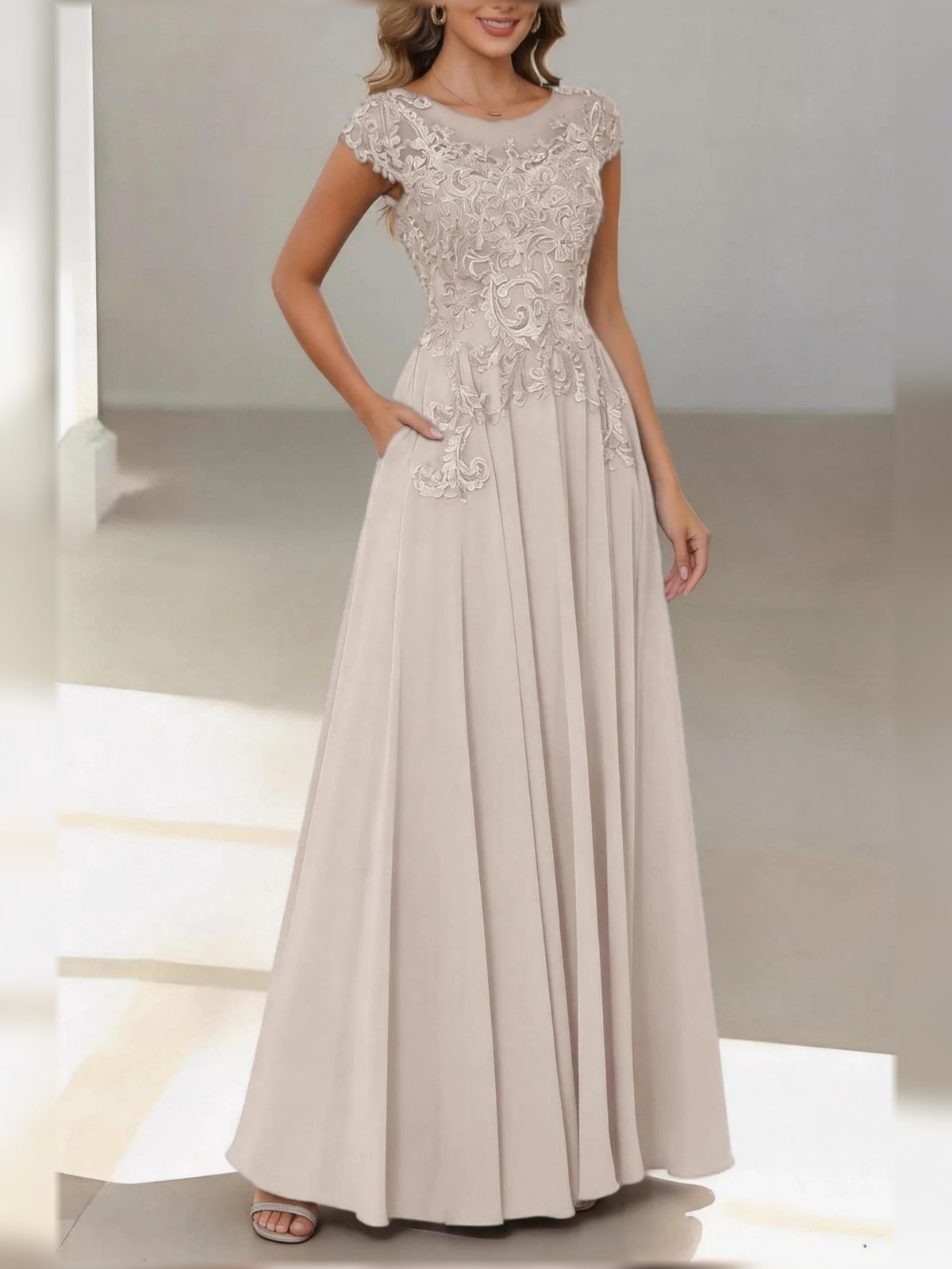 Champagne satin floral A-line dress with bateau neck, cap sleeves, draped waist bow