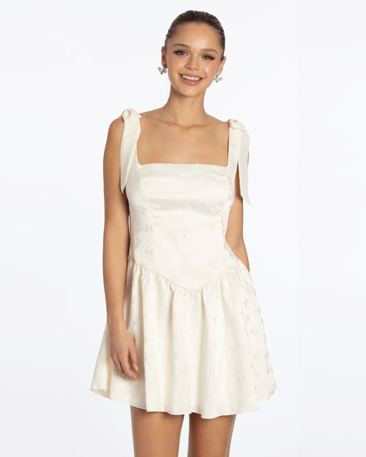 Cream satin A-line mini dress with square neckline and puffed bow shoulder straps