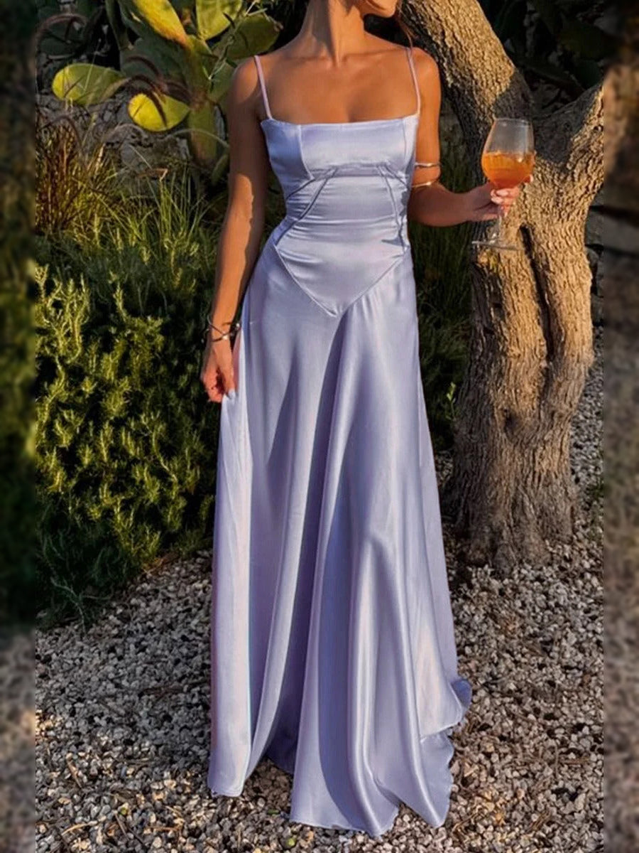 Lavender satin A-line prom dress with spaghetti straps, square neckline, long skirt.
