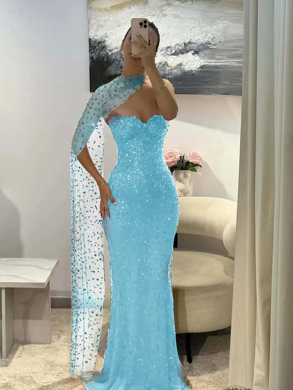 Light blue sequin sweetheart mermaid prom dress with long sheer side drape, floor-length