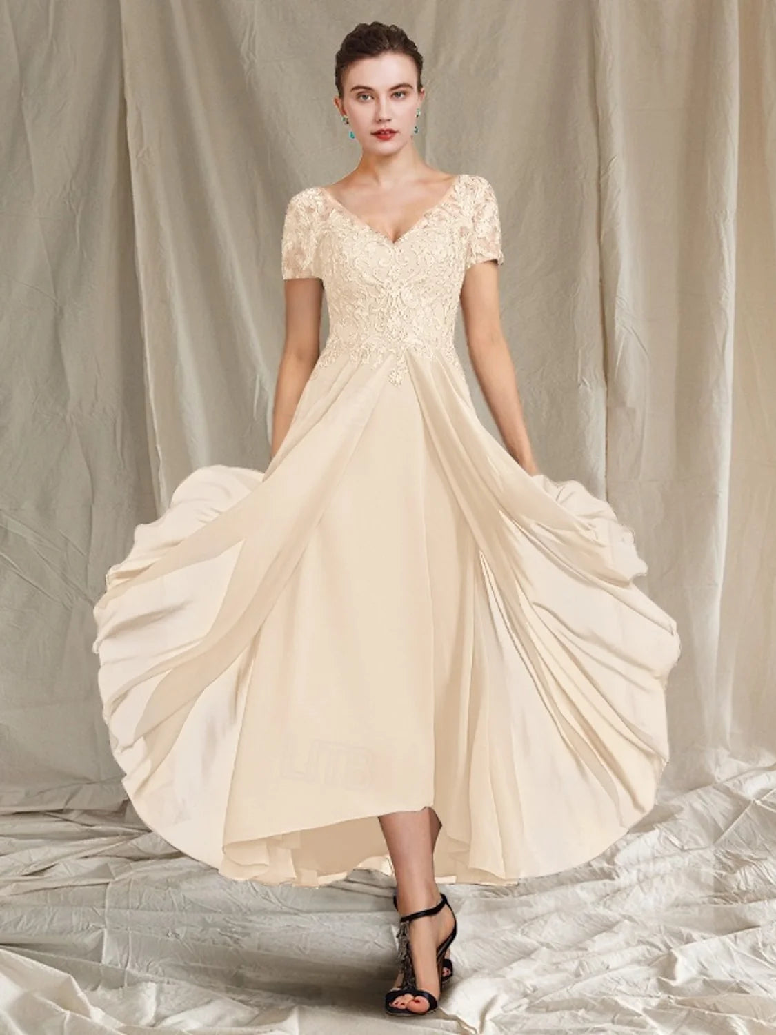 Champagne embroidered V-neck A-line dress with short sleeves and draped chiffon skirt
