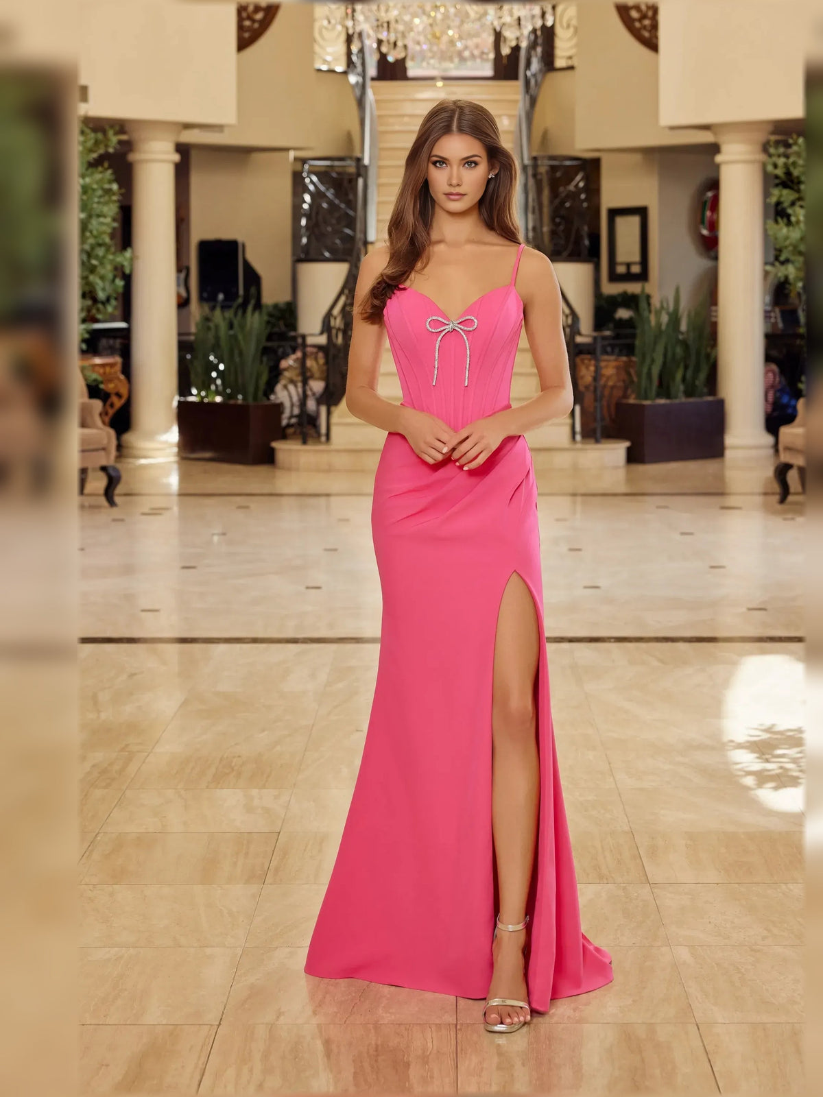 Hot pink sweetheart formal dress with crystal bow and ruched fitted skirt with slit