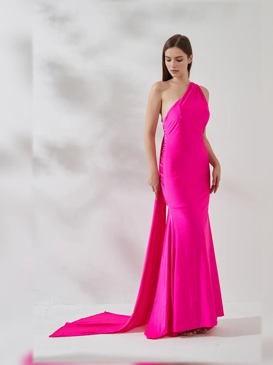 Hot pink one-shoulder mermaid dress with flowing train and draped bodice