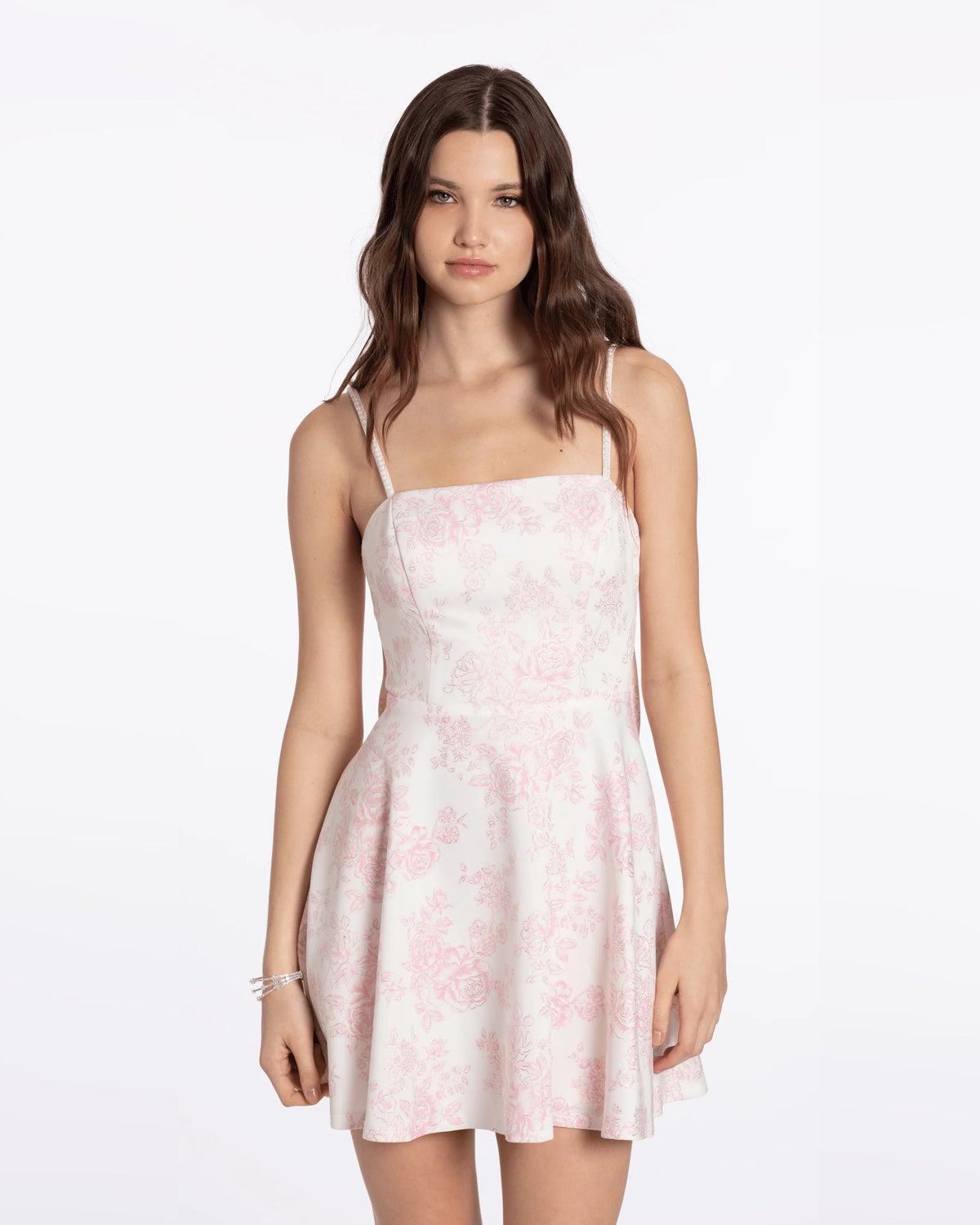 Ivory pink floral A-line slip dress with spaghetti straps and pleated skirt