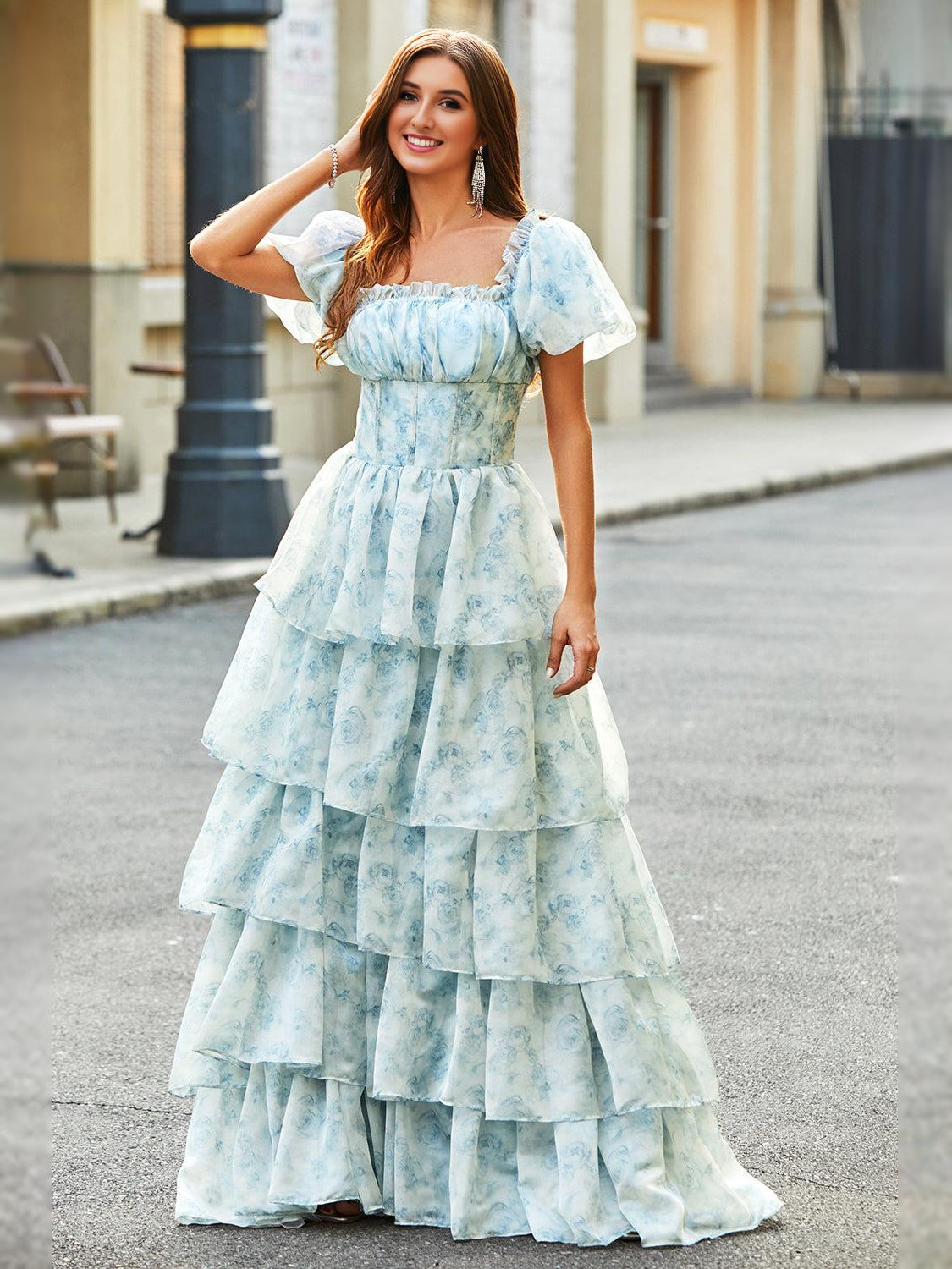 Sky blue off-shoulder tiered corset A-line prom dress, full front view, floor length.