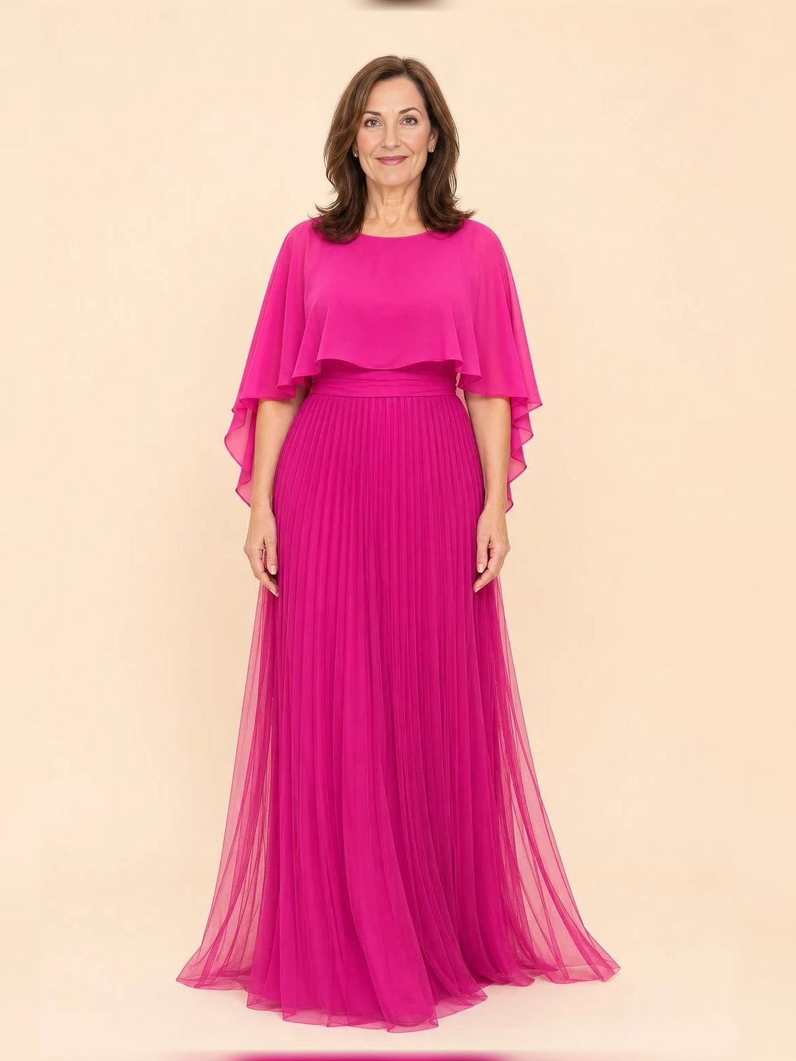 Hot pink pleated A-line dress with ruffled shoulder cape overlay, floor length