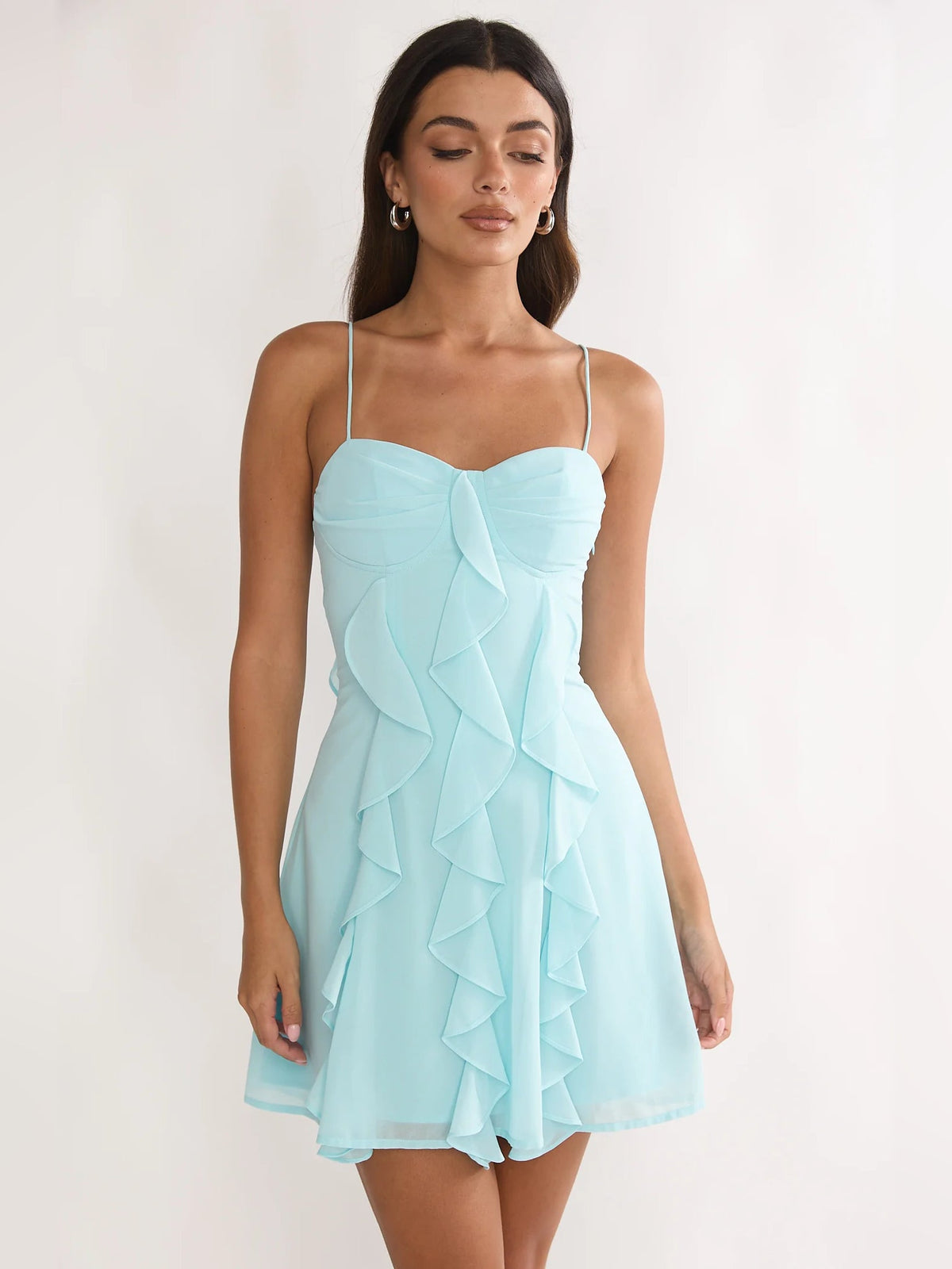 Aqua ruffled mini dress with sweetheart neckline and thin straps, layered ruffle skirt