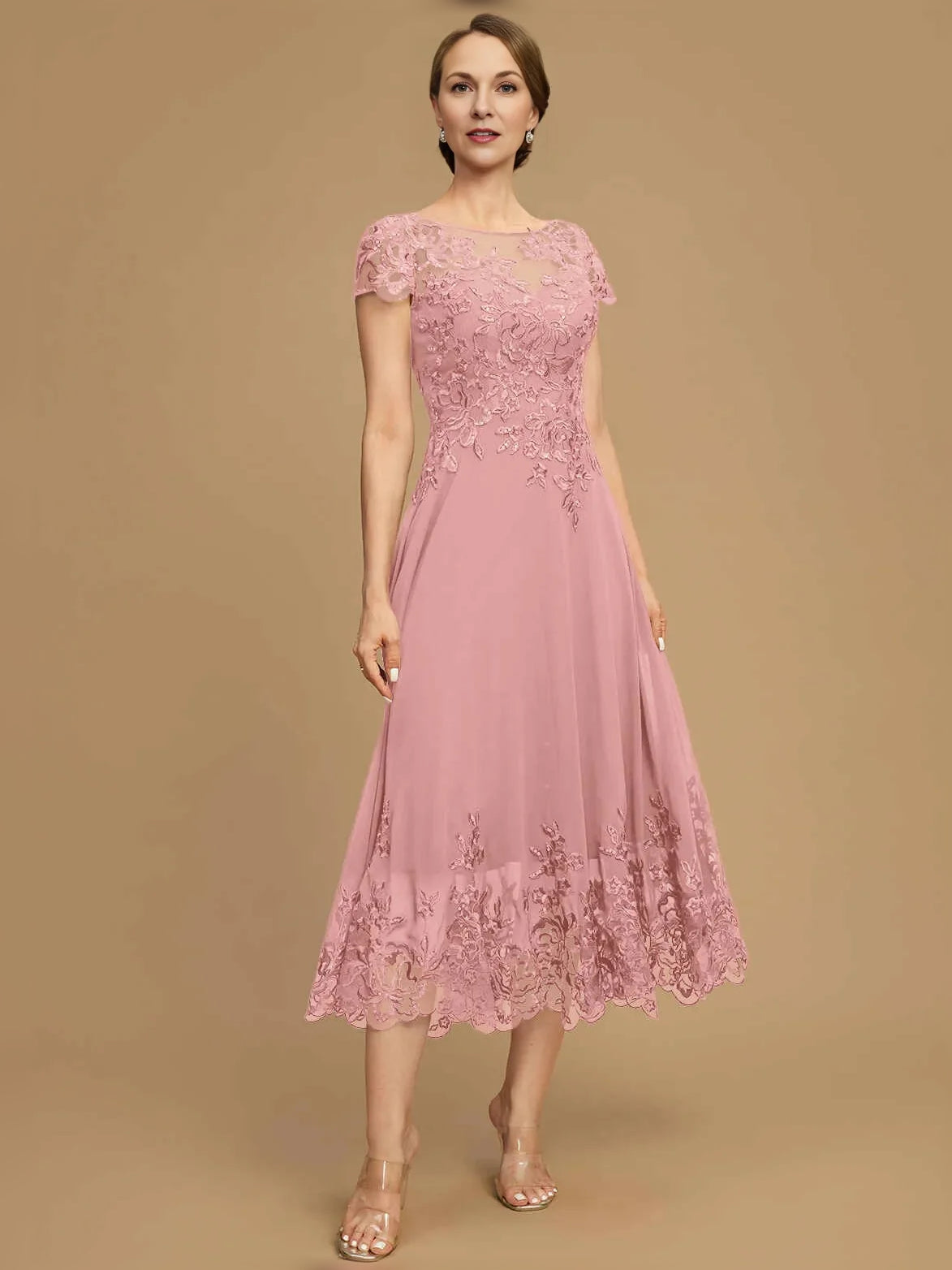 Light pink boat-neck A-line tea-length chiffon dress with cap sleeves and lace hem