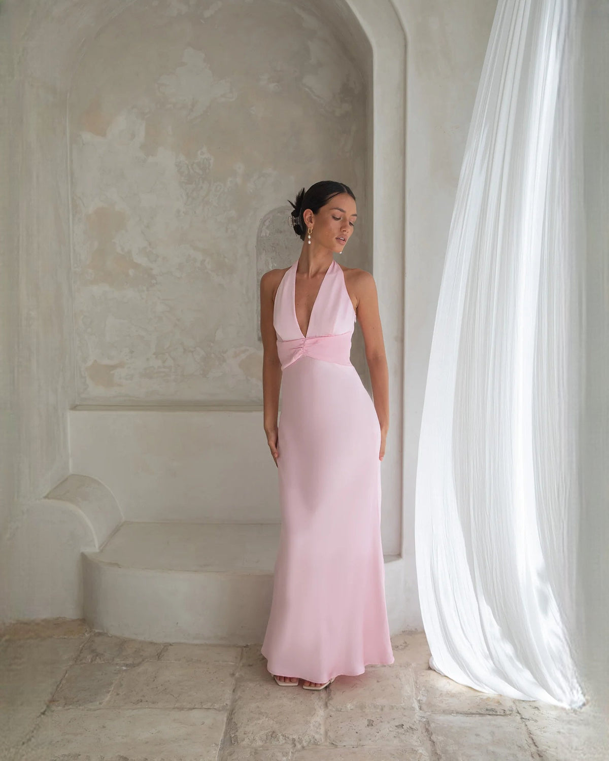 Pale pink satin halter A-line maxi bridesmaid dress with halter neckline