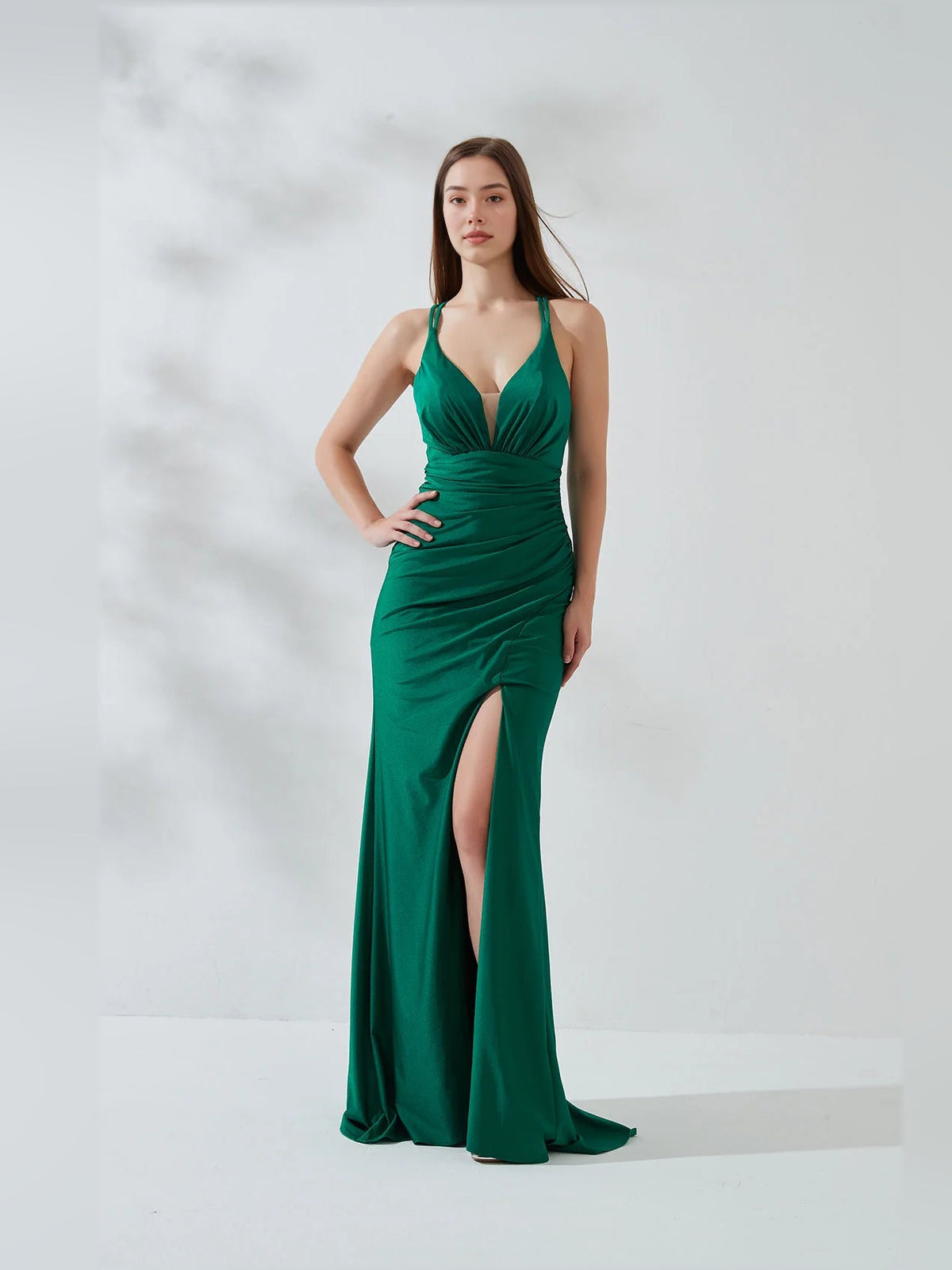 Dark green deep V-neck double-strap mermaid gown with ruched waist and front slit