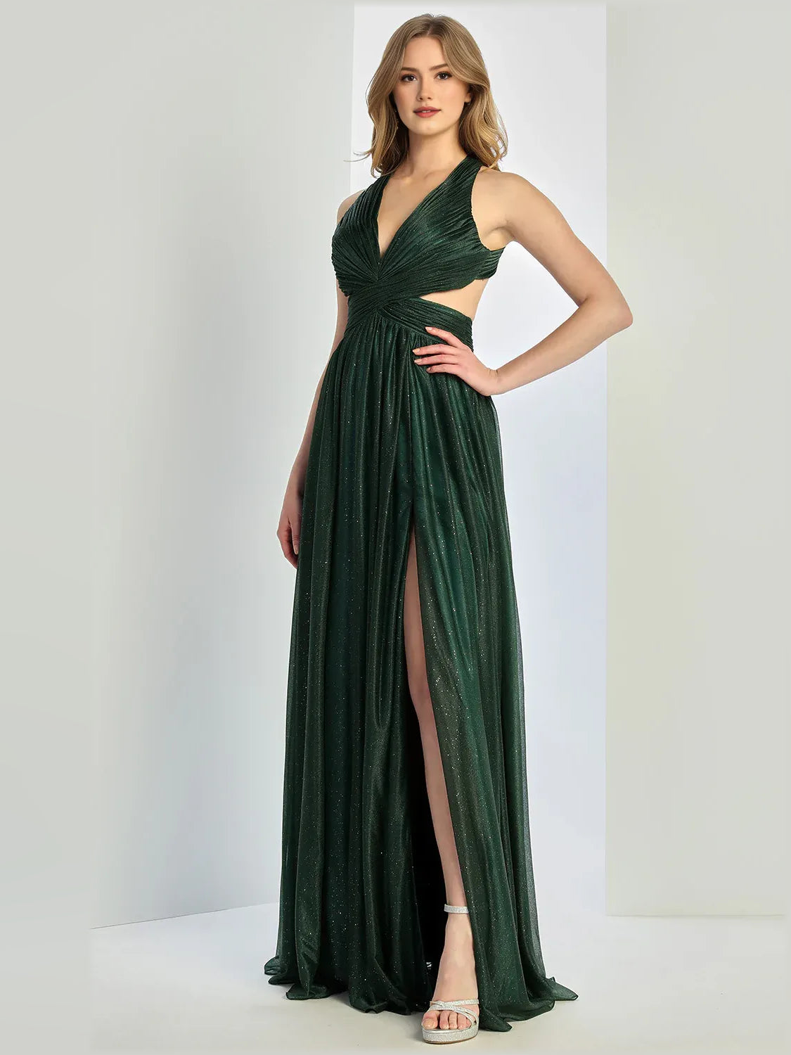 Dark green halter neck formal dress with gathered waist and full-length skirt