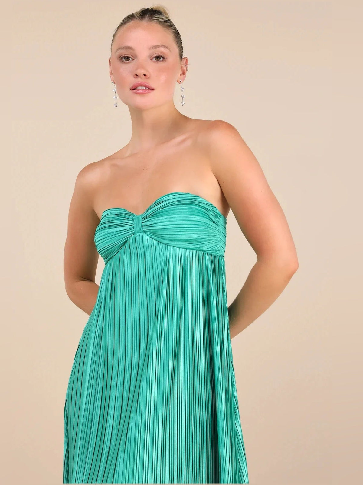 Teal satin strapless bridesmaid dress with ruched sweetheart bodice and pleated maxi column