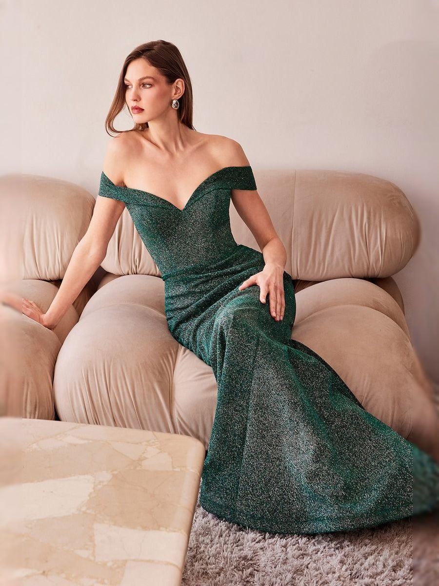 Teal glitter off-shoulder V-neck mermaid prom dress, floor-length, seated