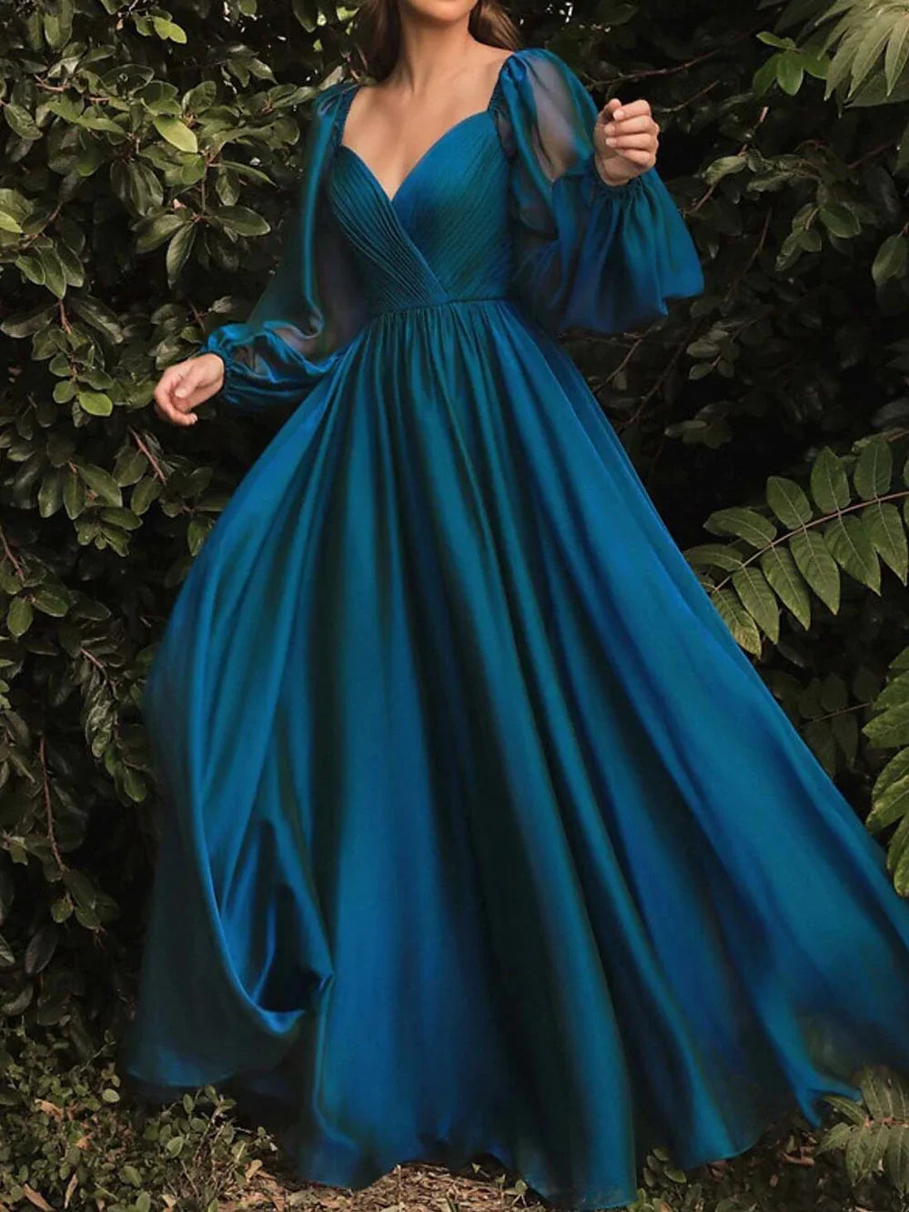 Teal V-neck long-sleeve A-line formal dress with gathered bodice and flowing skirt