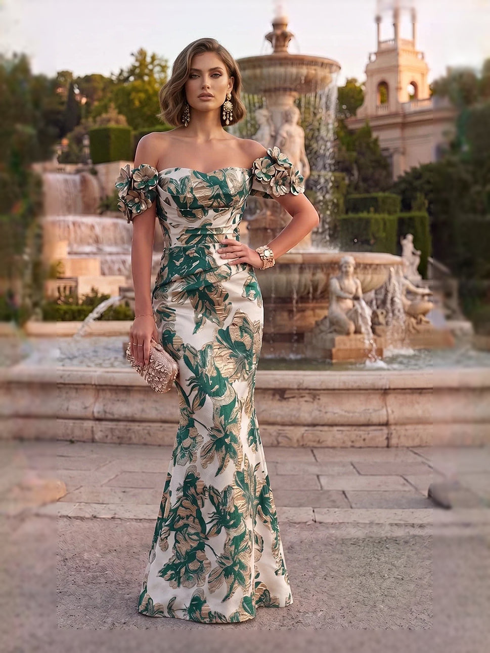 Dark green off-shoulder mermaid gown with ruched bodice and floral applique