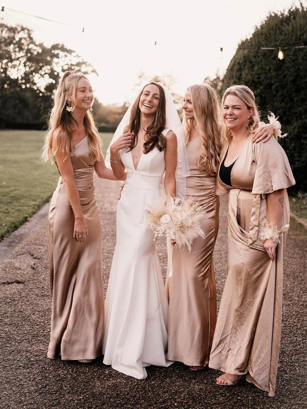 Dusty rose satin wrap bridesmaid dress with V-neck and long side slit