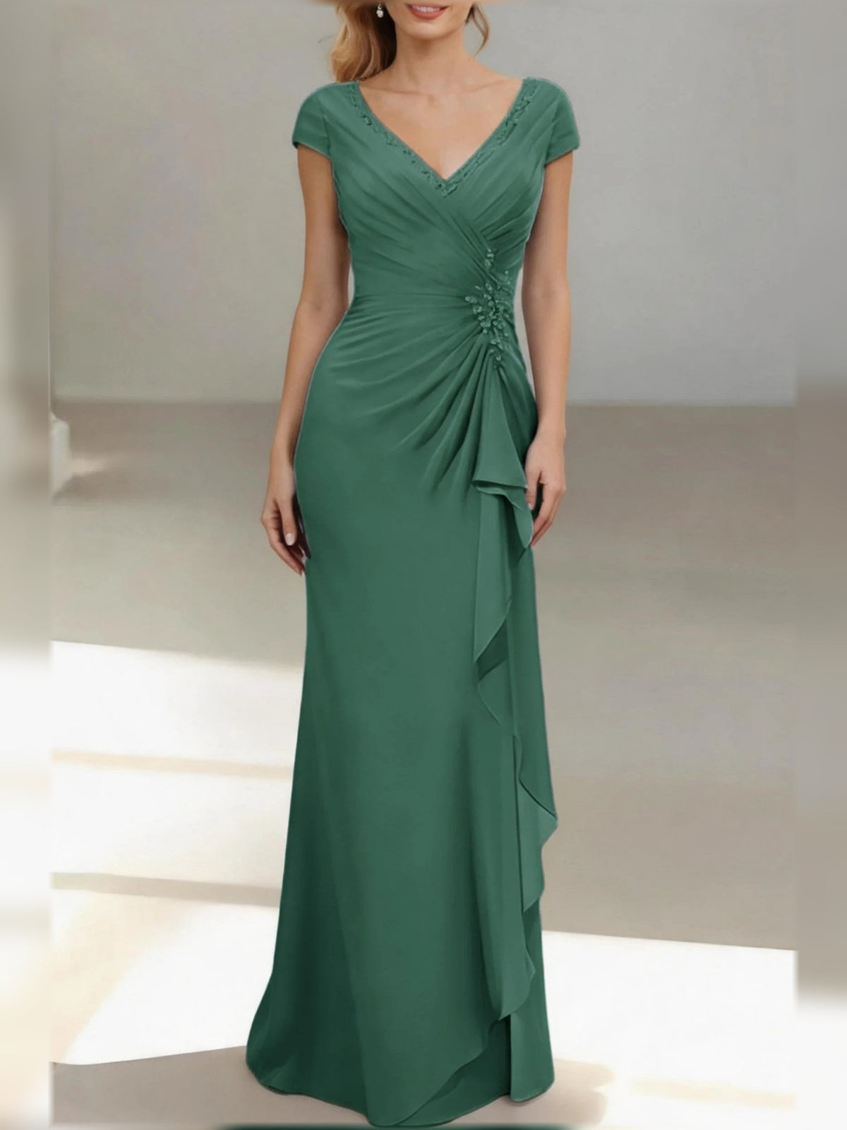 Emerald green ruched V-neck mermaid floor-length dress with cap sleeves and draped side ruffle